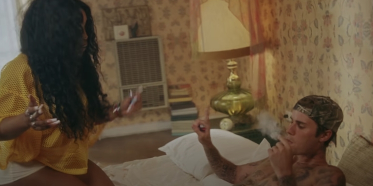 SZA features Justin Bieber, Benny Blanco, and more in Snooze Music Video
